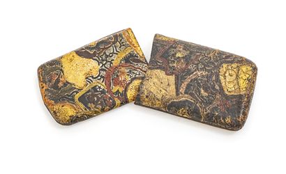 null Tobacco pouch

Japan, circa 1900

Made of worked and polychrome leather decorated...