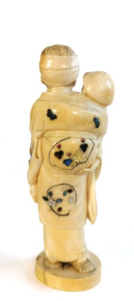 null *Japan, 1880

Carved ivory okimono featuring a figure carrying a child; both...