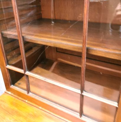 null Scriban bookcase opening with four drawers, the first one forming a secretary

Bookcase...