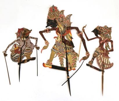 null Three Indonesian shadow theatre puppets with articulated arms made of cut and...