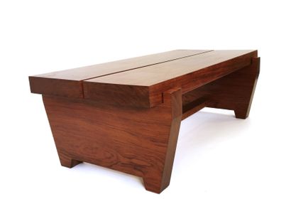 null Gabonese design circa 1980

Padouk coffee table, the top is made of two strips...