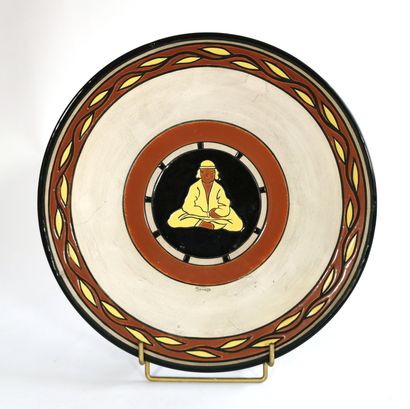 null SAMARA, circa 1930

Earthenware dish partially enamelled with central decoration...