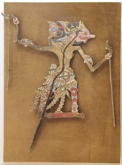 null Two Indonesian shadow puppets with articulated arms made of cut and painted...