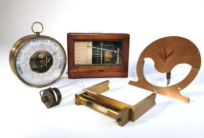 null Set of measuring instruments including an aviation barometer in its mahogany...