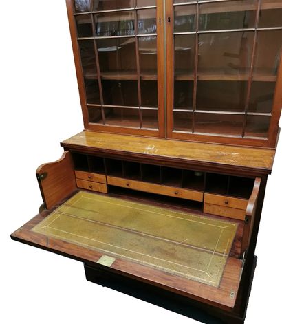 null Scriban bookcase opening with four drawers, the first one being a secretary

Bookcase...