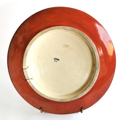 null SAMARA, circa 1930

Partially glazed earthenware dish with central decoration...