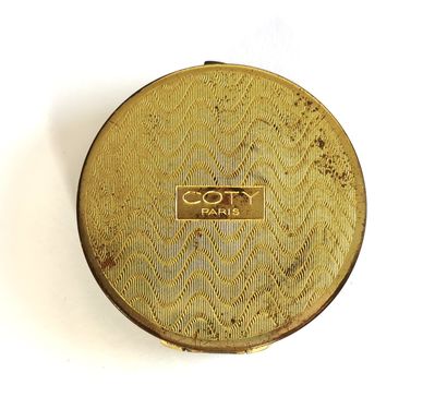 null Coty - "Air Spun" - (1920)

Bag powder case in stamped brass in the shape of...