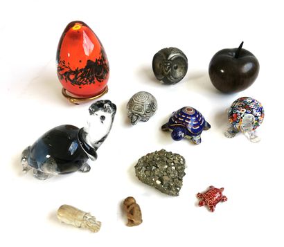 null Set including eight animal figurines of various materials, a piece of pyrite,...