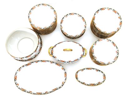 null Porcelain service set with Art Deco decoration of stylized flowers and geometrical...