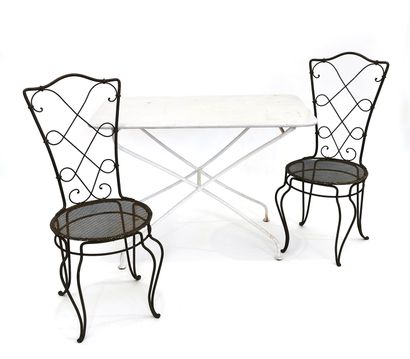 null Pair of wrought iron chairs with perforated seat and openwork back decorated...