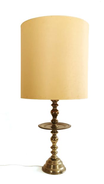 null A bronze and metal table lamp with a turned shaft and an intermediate circular...