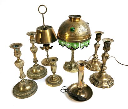 null Six bronze or brass candlesticks, two pairs

H. between 14,5 and 27 cm

One...