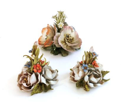 null CAPODIMONTE

Suite of three polychrome porcelain bouquets, one marked with a...