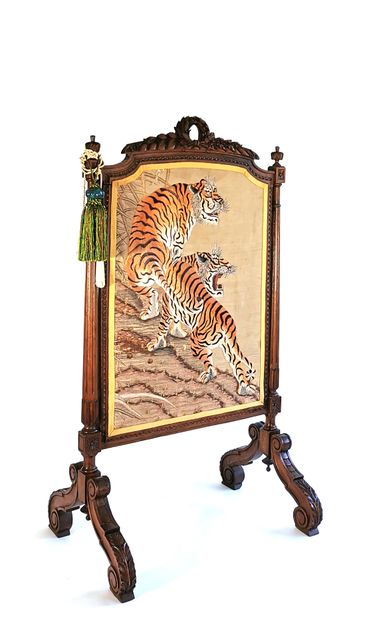 null Neoclassical style carved wood mantel screen, the screen decorated with tiger...