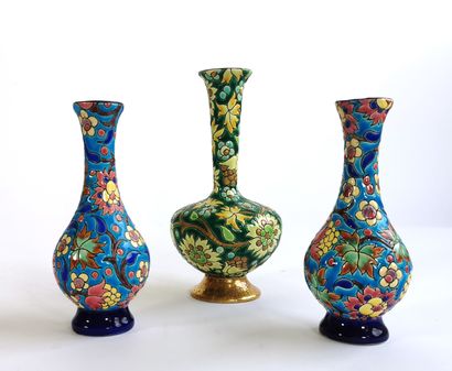 null LONGWY

Enameled earthenware lot including : 

- A pair of high necked vases,...