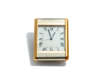 null CARTIER

Alarm clock with a brushed steel and gilded "tank" shape case with...