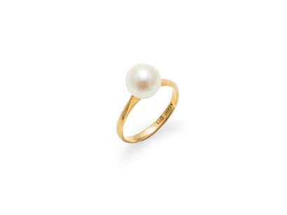 null Yellow gold ring 18K (750 thousandths) decorated with a cultured pearl 

TDD...