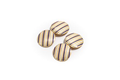 null Pair of 18K (750 thousandths) yellow gold cufflinks with white and blue enamel...