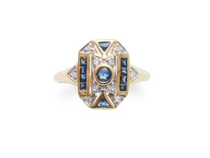 null Yellow and white gold ring 18K (750 thousandths) decorated with a round faceted...