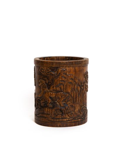 null China, 19th - 20th century 

Carved bamboo brush pot, the decoration showing...