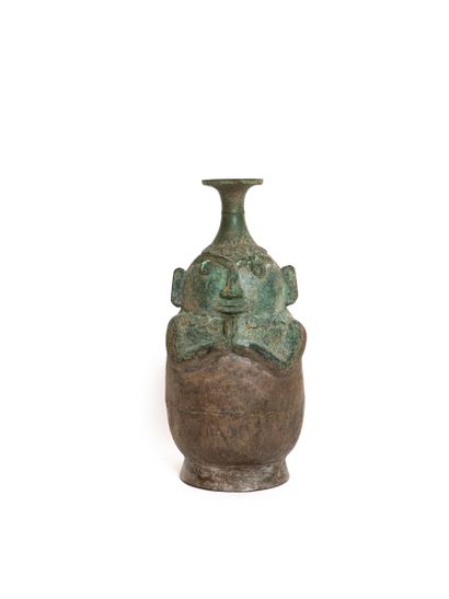 null Cambodia or Thailand, 12th century 

Bronze ritual container with an excavation...