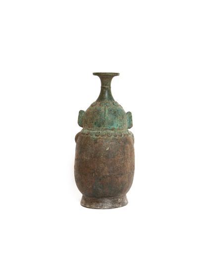 null Cambodia or Thailand, 12th century 

Bronze ritual container with an excavation...