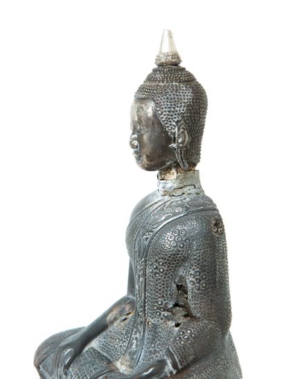 null Cambodia or Thailand, 19th century 

Silver embossed Buddha figure, depicted...