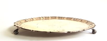 null Silver tray (925 thousandths), the scalloped marly, it rests on three feet with...