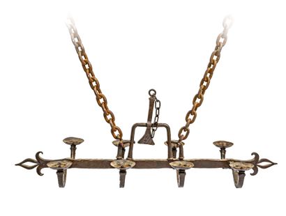 null Suspension with eight lights out of wrought iron; the arms supporting circular...