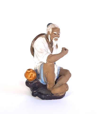 null CHINE 

Pêcheur

Figurine en grès émaillé

H. 12,5 cm

Accident