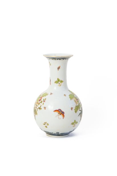 null CHINA

Porcelain vase with polychrome decoration of planters and butterflies

Mark...