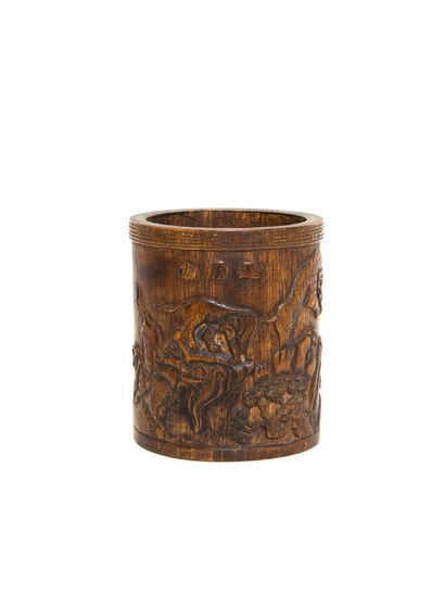 null China, 19th - 20th century 

Carved bamboo brush pot, the decoration showing...
