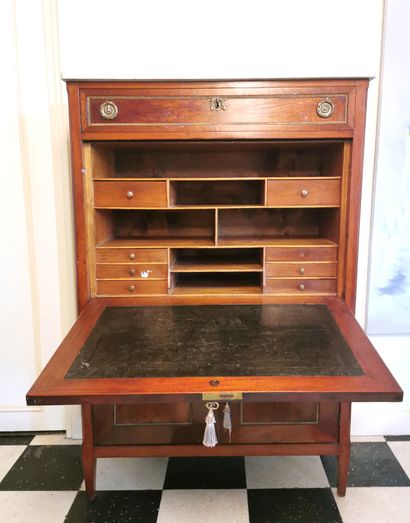 null Louis XVI style mahogany and mahogany veneer desk opening to a drawer, a flap...