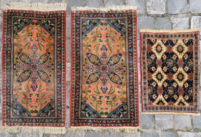 null Lot of three carpets

A and B: Pair of Ardebil rugs (Iran) circa 1975 with floral...