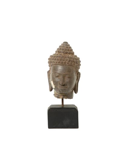 null CAMBODIA

Buddha head in sandstone in the Khmer style of Angkor Wat from the...