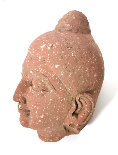 null INDIA, in the Kushan style of the 2nd - 3rd century

Buddha's head in red sandstone,...