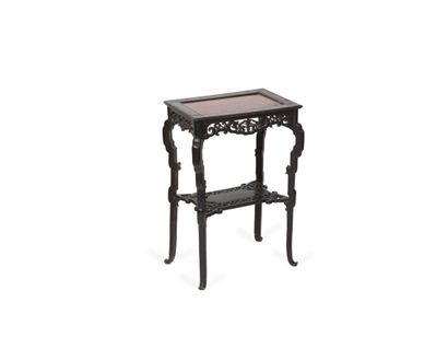 null CHINA, 19th century

Small table in carved and blackened wood with openwork...