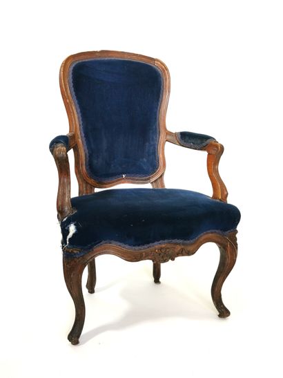 null Child's armchair with a high cabriolet back in molded and carved beech wood;...