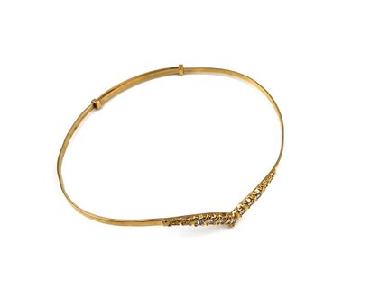 null Thin and rigid bracelet in gold 18K (750 thousandths) center by a central motive...