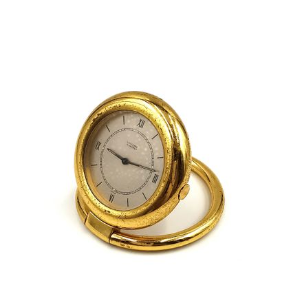 null Van Cleef Arpels

Gilt metal travel clock, silver dial with Roman numerals

Signed...