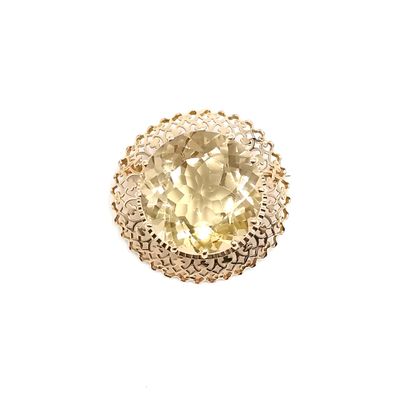 null Brooch decorated with an important round facetted citrine, the setting is in...