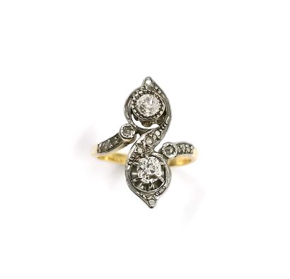 null Two-tone gold "toi et moi" ring set with two round old-cut diamonds in a rose-cut...