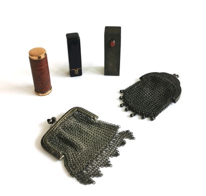 null Three lipstick cases, one black lacquered

Two silver-plated metal purses are...