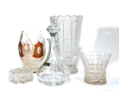 null A crystal lot including a cognac decanter, three vases (one cracked) and a covered...