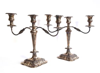 null Pair of silver candelabra with three lights (925 thousandths) with floral friezes,...