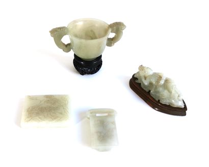 null 
CHINA, 




A cup, two belt buckles and a nephrite jade figurine




L. between...