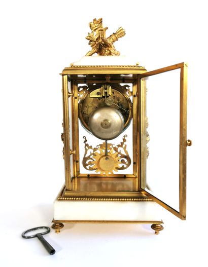 null Neoclassical style mantel clock in chased and gilt bronze, marble, enamel and...