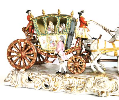 null A large polychrome porcelain and copper group showing a royal carriage on a...