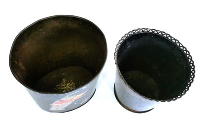 null Pair of black lacquered metal paper baskets decorated with friezes for one and...