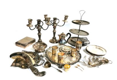 null Set of silver plated pieces including a pair of candelabra, a dumb waiter, trays,...